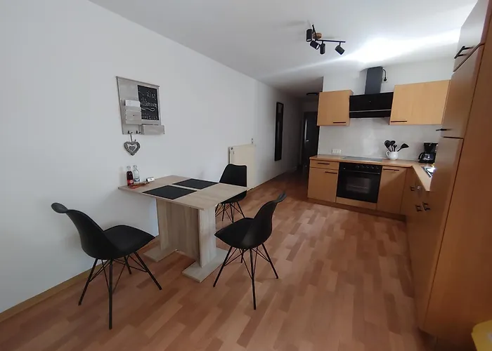 Haus Blumenampel